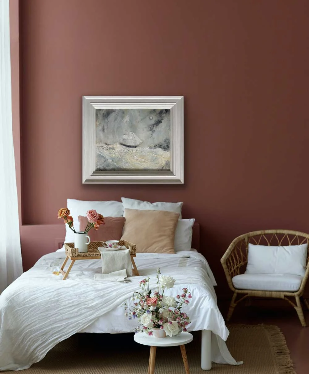 Homeward Under The Moonlit Sky Seascape Painting in a warm cosy bedroom setting by Emily McCormack
