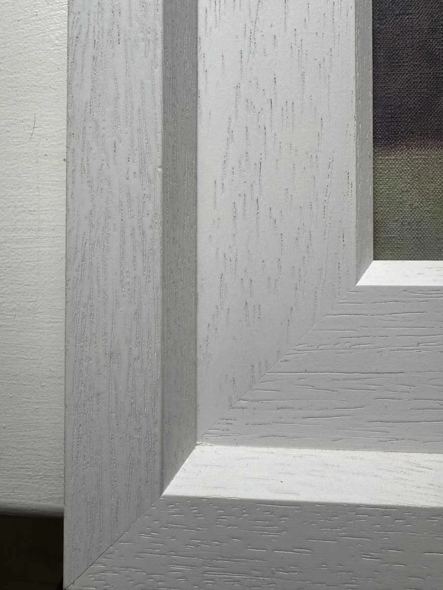 Minor imperfection in complimentary frame to be aware of
