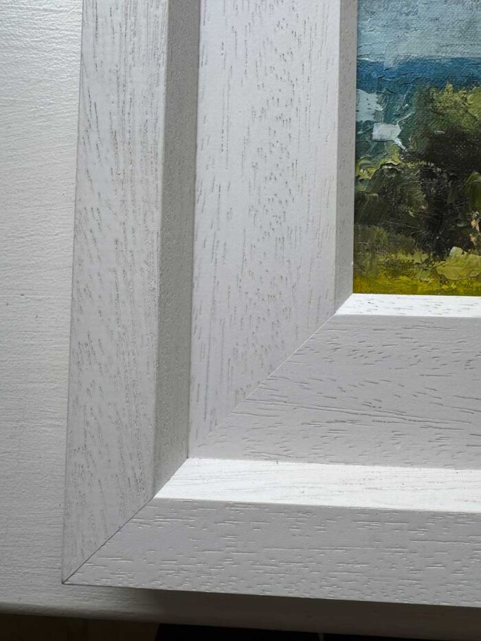 Minor imperfection in complimentary frame to be aware of
