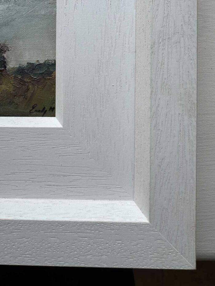 Minor imperfection in complimentary frame to be aware of