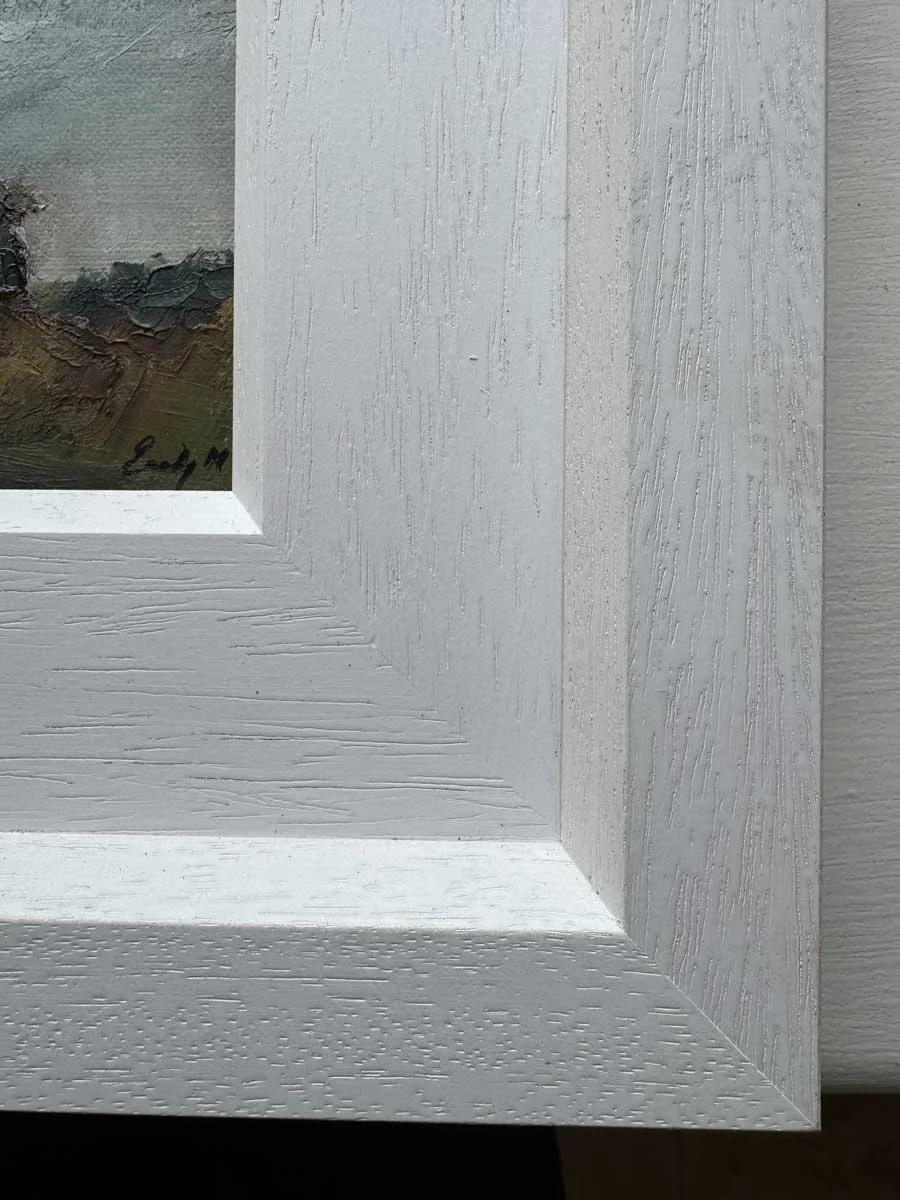 Minor imperfection in complimentary frame to be aware of