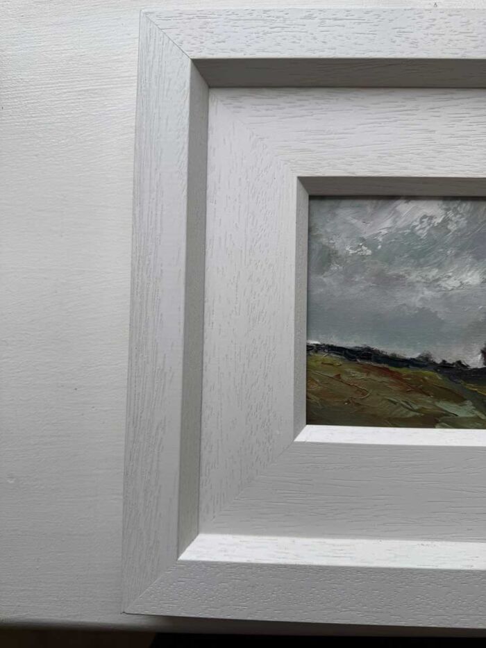 Minor imperfection in complimentary frame to be aware of