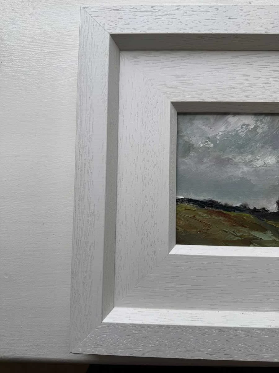 Minor imperfection in complimentary frame to be aware of