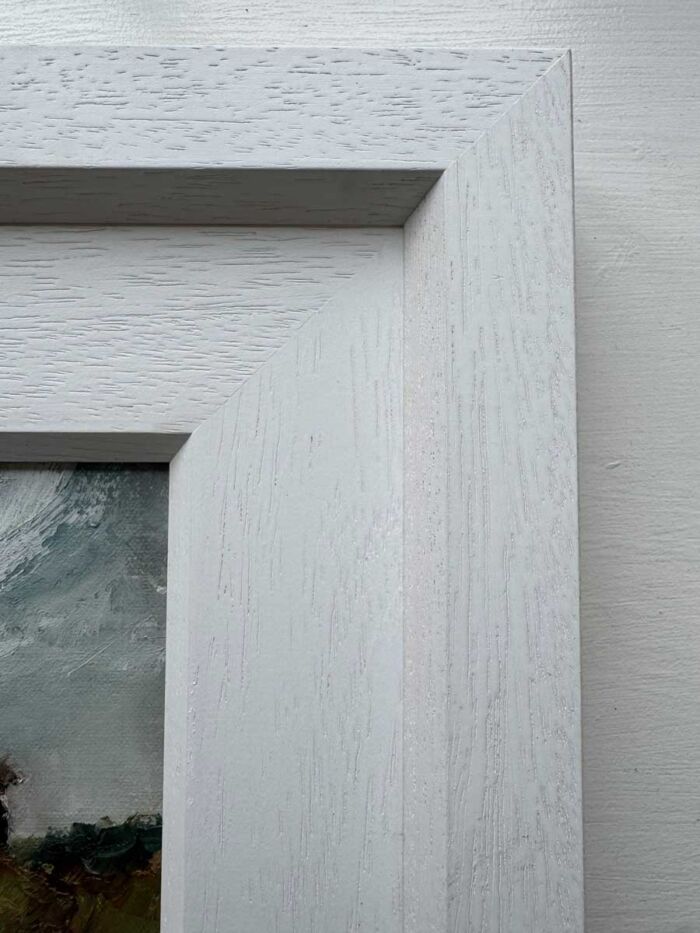 Minor imperfection in complimentary frame to be aware of